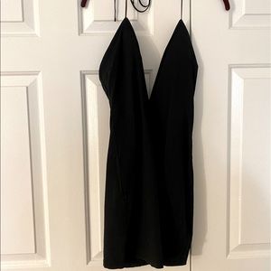 Sexy little black dress with plunging V neck🔥🔥